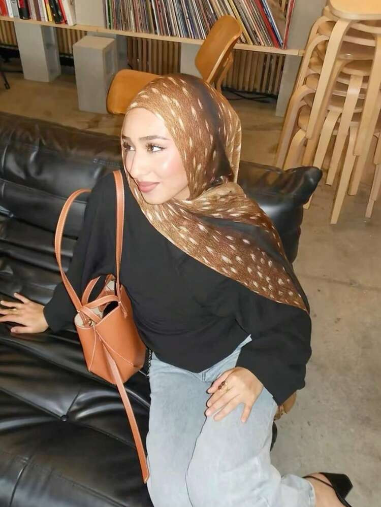 Black Top and Grey Jeans with Deer Print Hijab Black Top and Grey Jeans with Deer Print Hijab — Hijab Outfits 2027