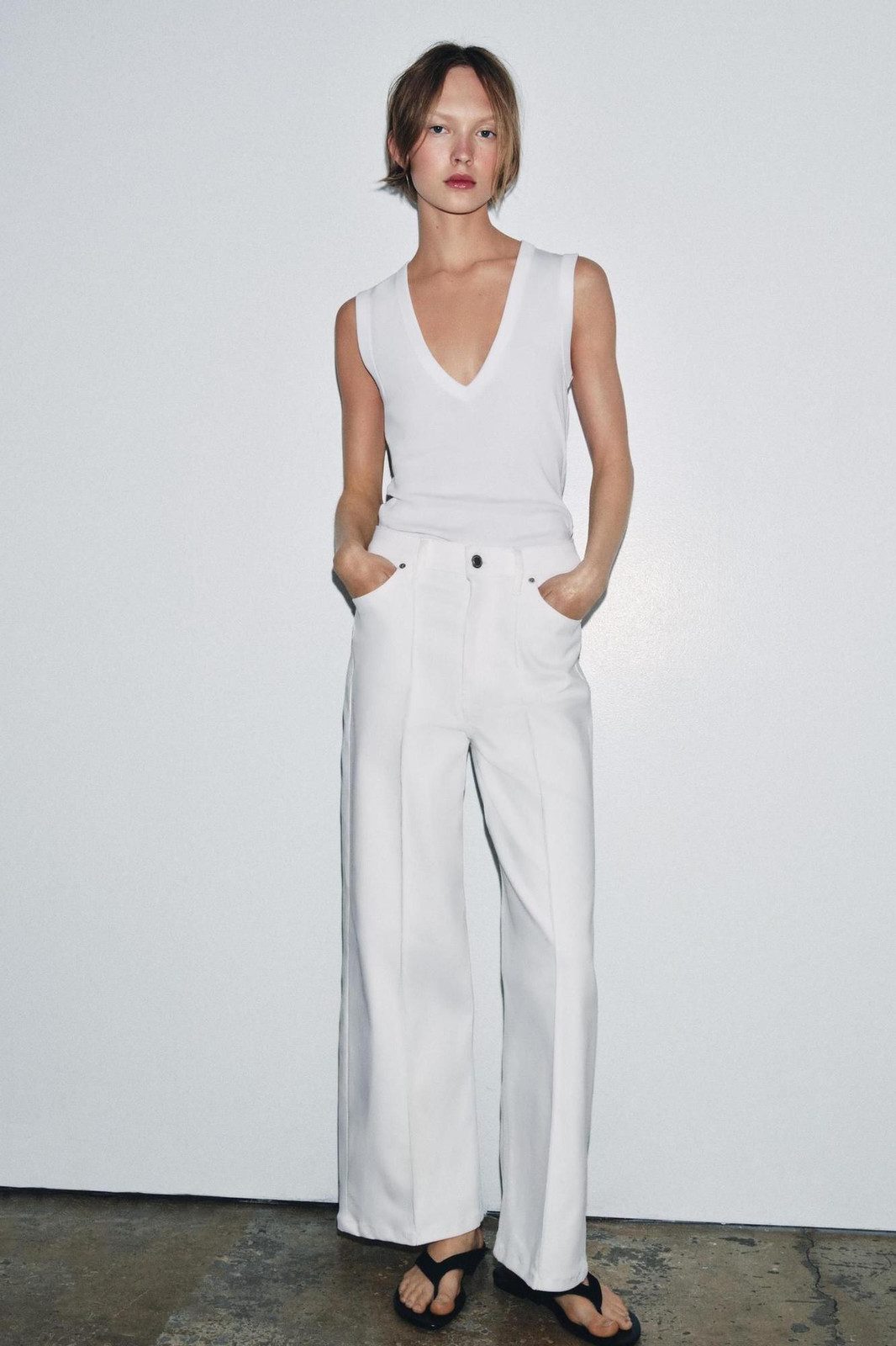 Minimalist White: Wide-Leg Jeans with Sleeveless Top Minimalist White: Wide-Leg Jeans with Sleeveless Top — White Jeans Outfits 2027