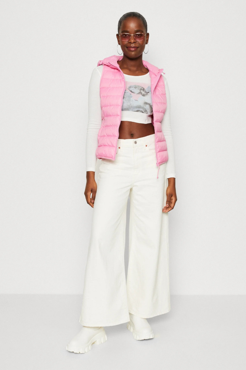 Pink Puffer Vest with Wide-Leg Jeans — Tumblr Outfits 2027