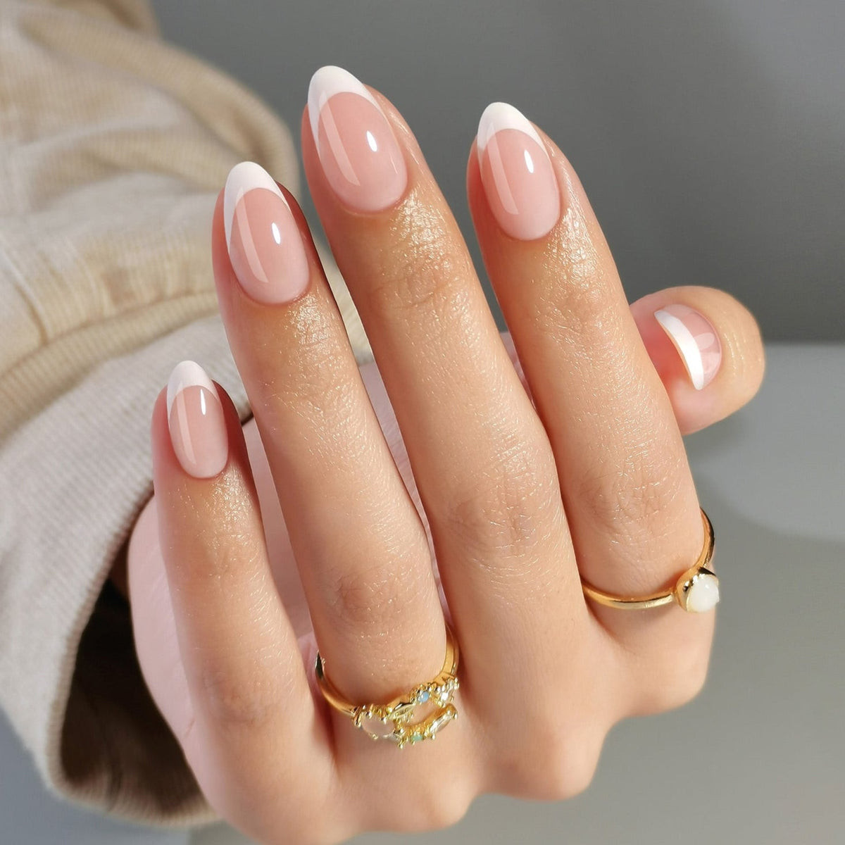 Classic White French with Gold Ring Accents — Medium Almond Nails 2027