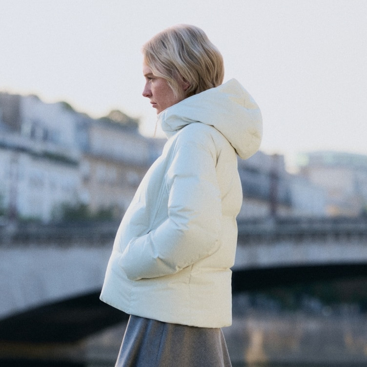 Casual Off-White Cropped Hooded Puffer and Grey Skirt — Winter Outfits 2027 with Puffer
