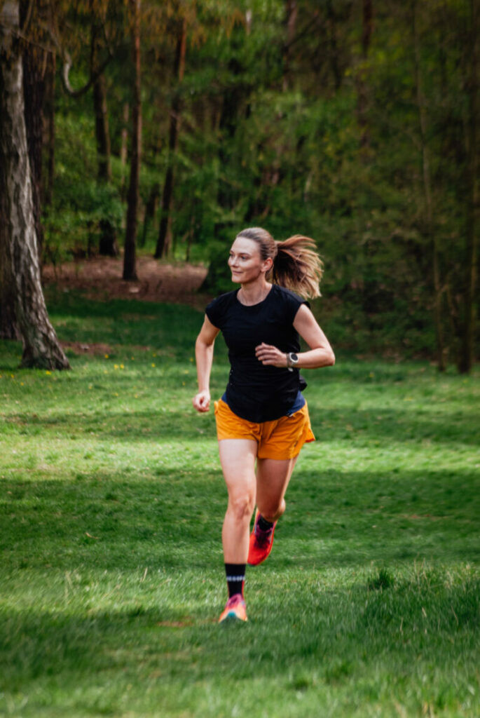 Black T-Shirt and Orange Shorts with Vibrant Red/Pink Footwear Black T-Shirt and Orange Shorts with Vibrant Red/Pink Footwear — Running Outfits for Women 2027