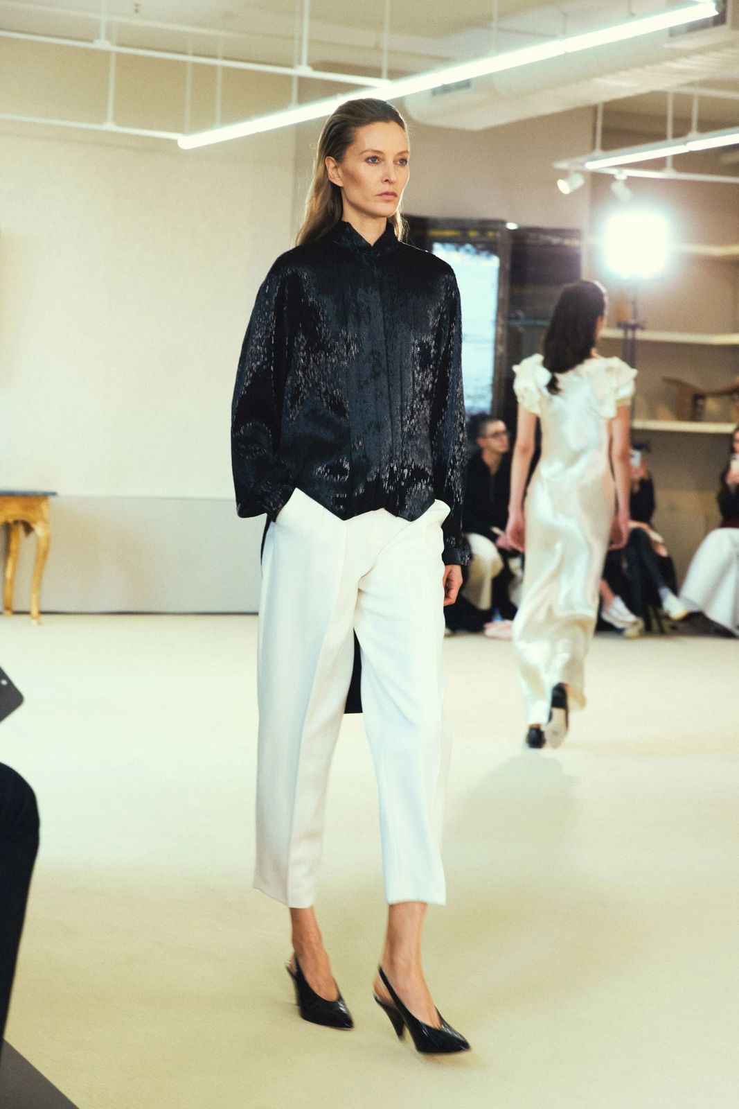 Modern Texture: Black Blouse and White Wide-Leg Trousers Modern Texture: Black Blouse and White Wide-Leg Trousers — Interview Outfits 2027