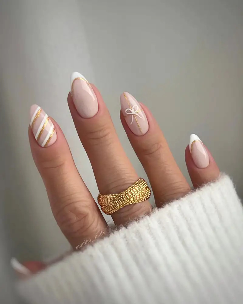 Sheer Nude Tan White Bow Gold Bead Almond Nails Sheer Nude Tan White Bow Gold Bead Almond Nails — Short Bow Nails 2027