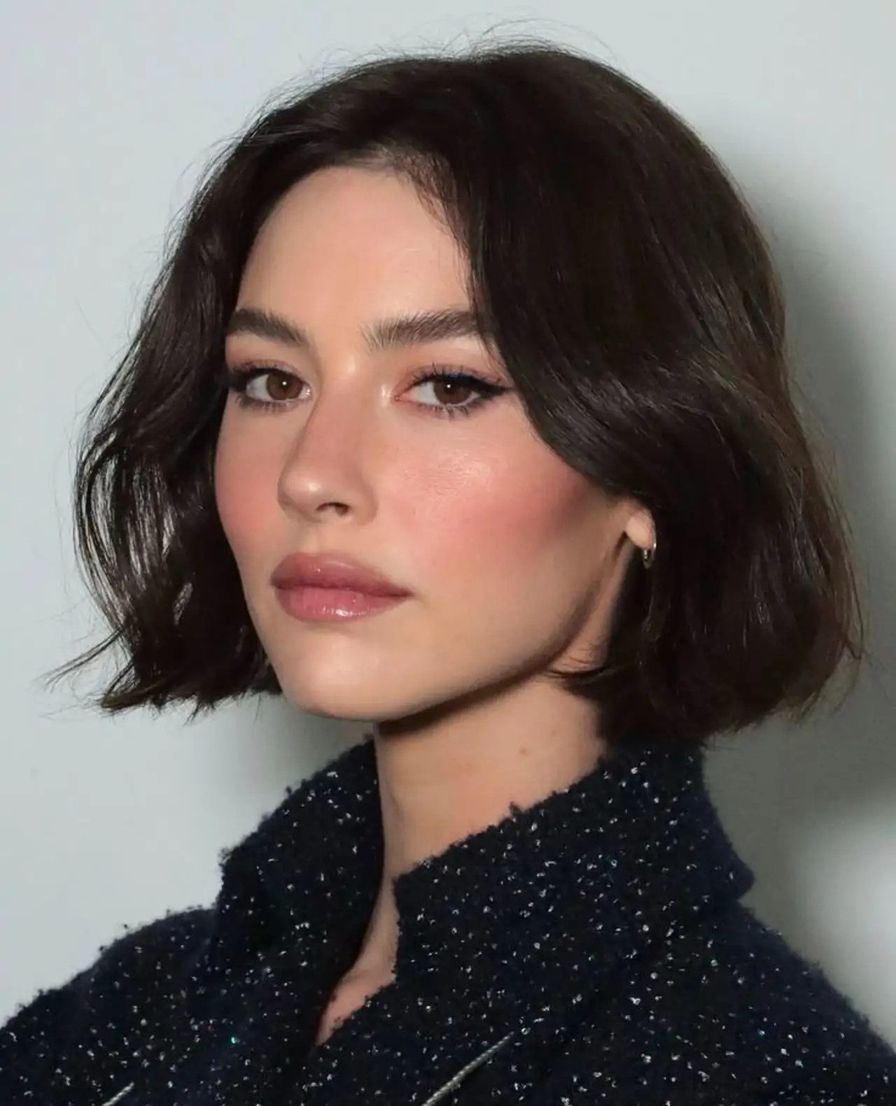 Sleek Dark Brown Bob With Waved Ends Sleek Dark Brown Bob With Waved Ends — Aesthetic Hairstyles 2027