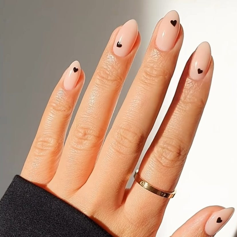 Small Black Heart Motif On Accent Nails Visual Idea Small Black Heart Motif On Accent Nails Visual Idea — Neutral Wedding Nails 2027