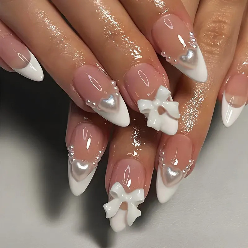 Medium Almond Sheer Pink White French Pearl Bow Nails Medium Almond Sheer Pink White French Pearl Bow Nails — Short Bow Nails 2027
