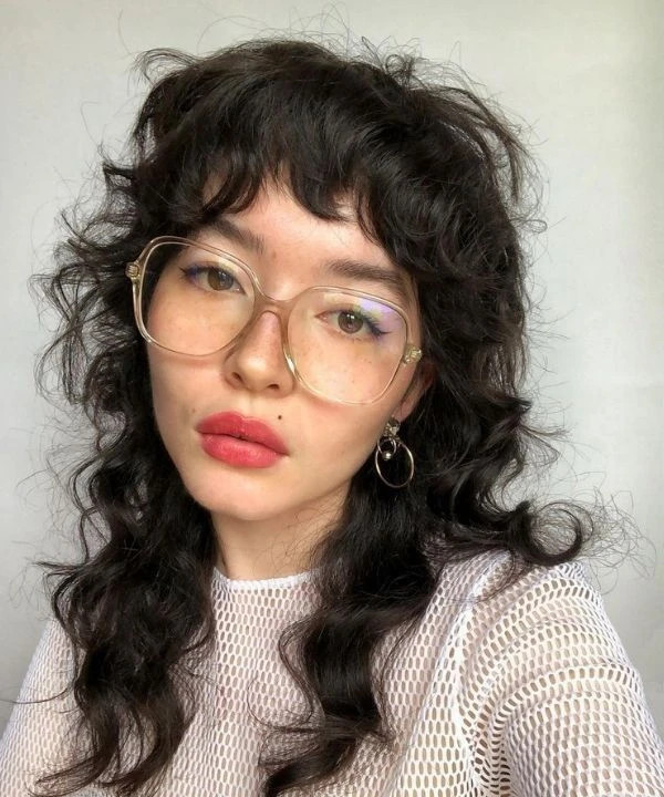 Thick Curly Wolf Cut With Curtain Bangs Thick Curly Wolf Cut With Curtain Bangs — Curly Wolf Cut 2027