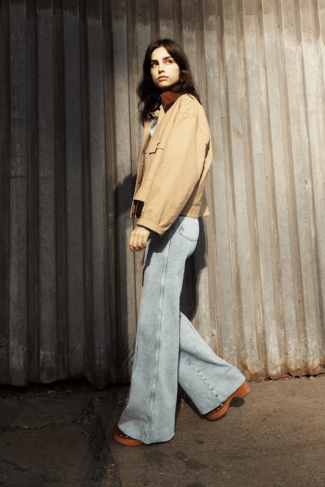 Extremely Wide Leg Jeans with Tan Jacket and Rust Turtleneck — Wide Leg Jeans Outfits 2027