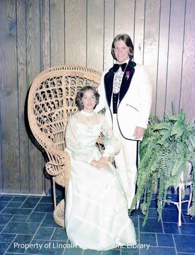 White Tuxedo with Black Lapels and Light Green Empire Waist Gown White Tuxedo with Black Lapels and Light Green Empire Waist Gown — Prom Couple Outfits 2027