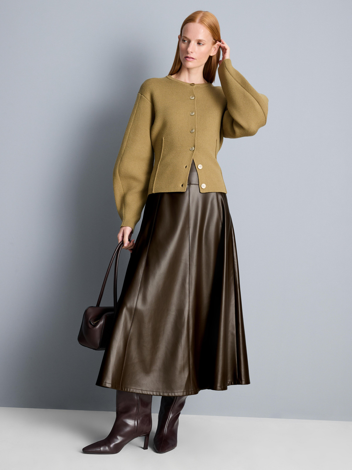 Autumnal Textures: Olive Knit Cardigan Over Faux Leather Midi Skirt — Slip Skirt Outfits 2027