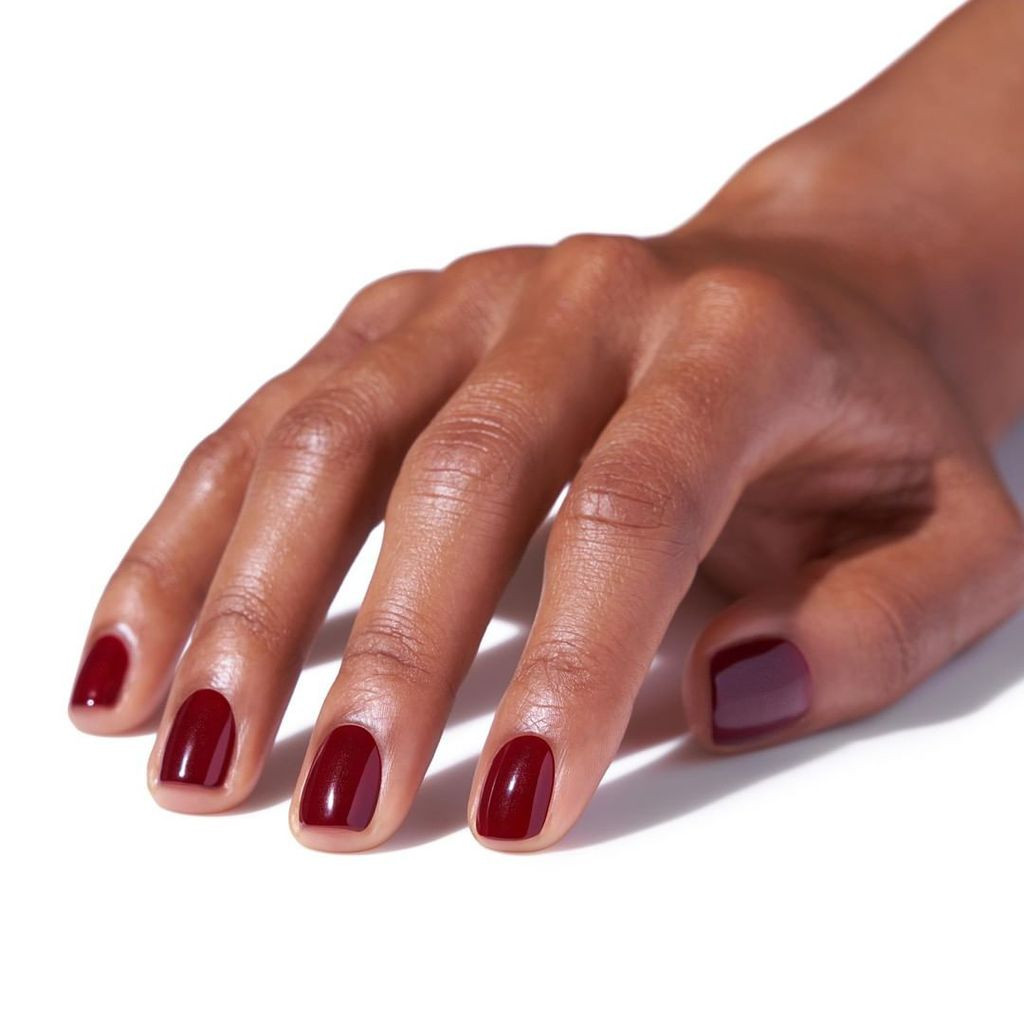 Glossy Deep Red Short Oval Nails — Nails 2027 for Brown Skin