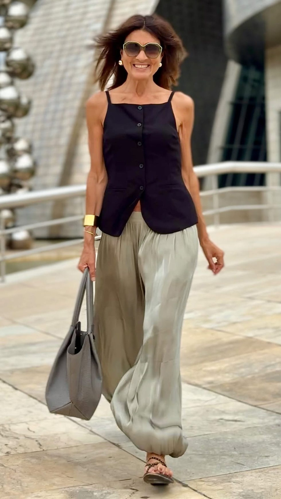 Chic Comfort: Black Vest and Pale Green Pants for a Relaxed Anniversary Chic Comfort: Black Vest and Pale Green Pants for a Relaxed Anniversary — Anniversary Outfits 2027