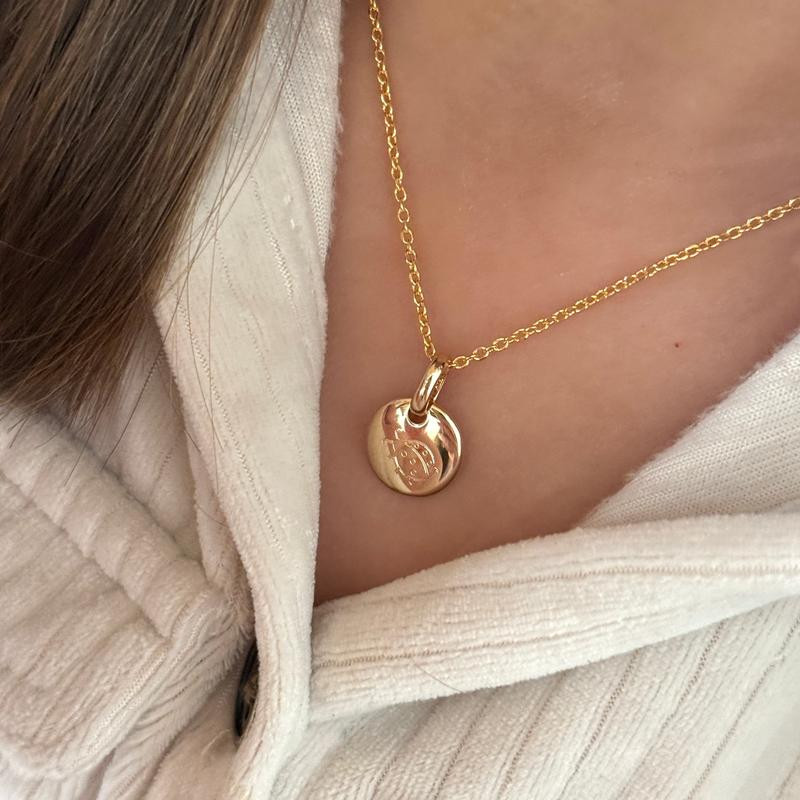 White Collared Shirt Styled with a Simple Gold Locket White Collared Shirt Styled with a Simple Gold Locket — Locket Necklaces 2027