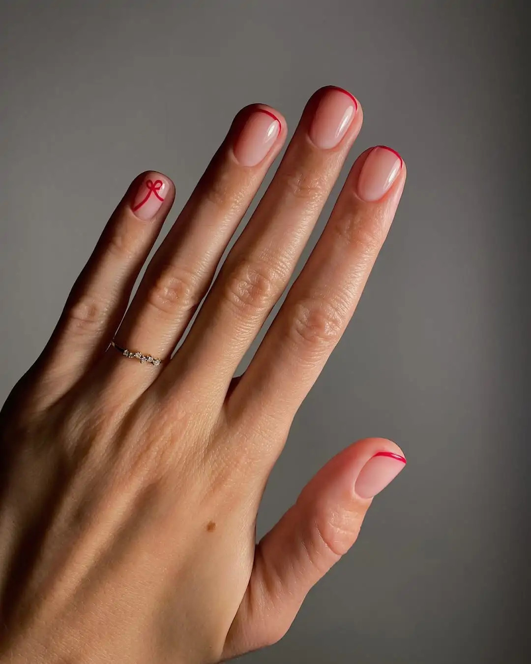 Valentines Day Sheer Nude Red Bow Thin French Nails Valentines Day Sheer Nude Red Bow Thin French Nails — Short Bow Nails 2027