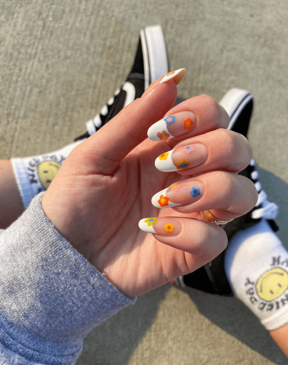 Small Colorful Flowers On French Tips Visual Idea Small Colorful Flowers On French Tips Visual Idea — Summer French Tip Nails 2027