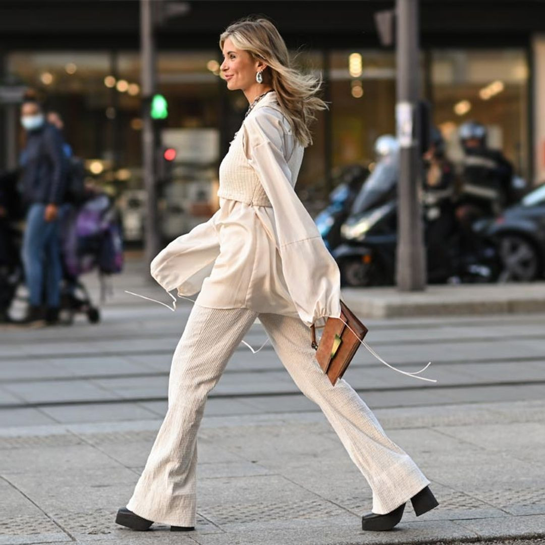 Off-White Satin Blouse with Wide-Leg Ribbed Trousers and Platform Shoes Off-White Satin Blouse with Wide-Leg Ribbed Trousers and Platform Shoes — Winter Neutral Outfits 2027