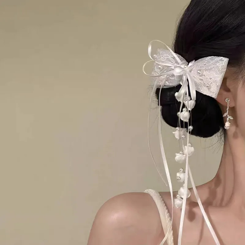 Visual Idea — The Hair Is Styled Neatly — Claw Clip Bun 2027