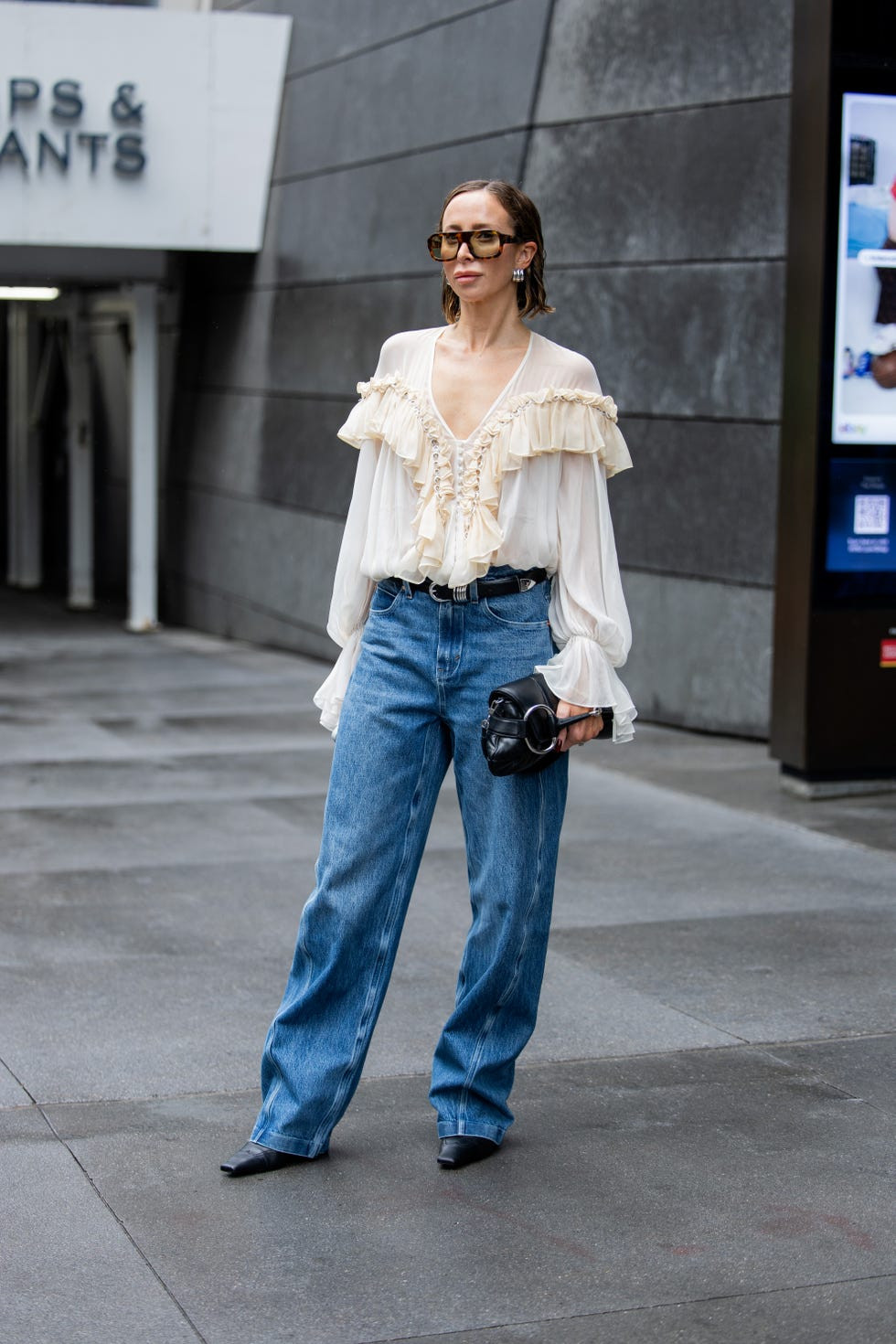 Sheer Ruffle Blouse Meets Relaxed Denim for Effortless Chic Sheer Ruffle Blouse Meets Relaxed Denim for Effortless Chic — Ruffle Top Outfits 2027