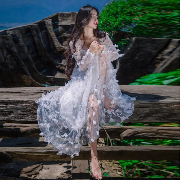 Ethereal Honeymoon Dress: White Sheer Floral Appliques Ethereal Honeymoon Dress: White Sheer Floral Appliques — Honeymoon Outfits 2027