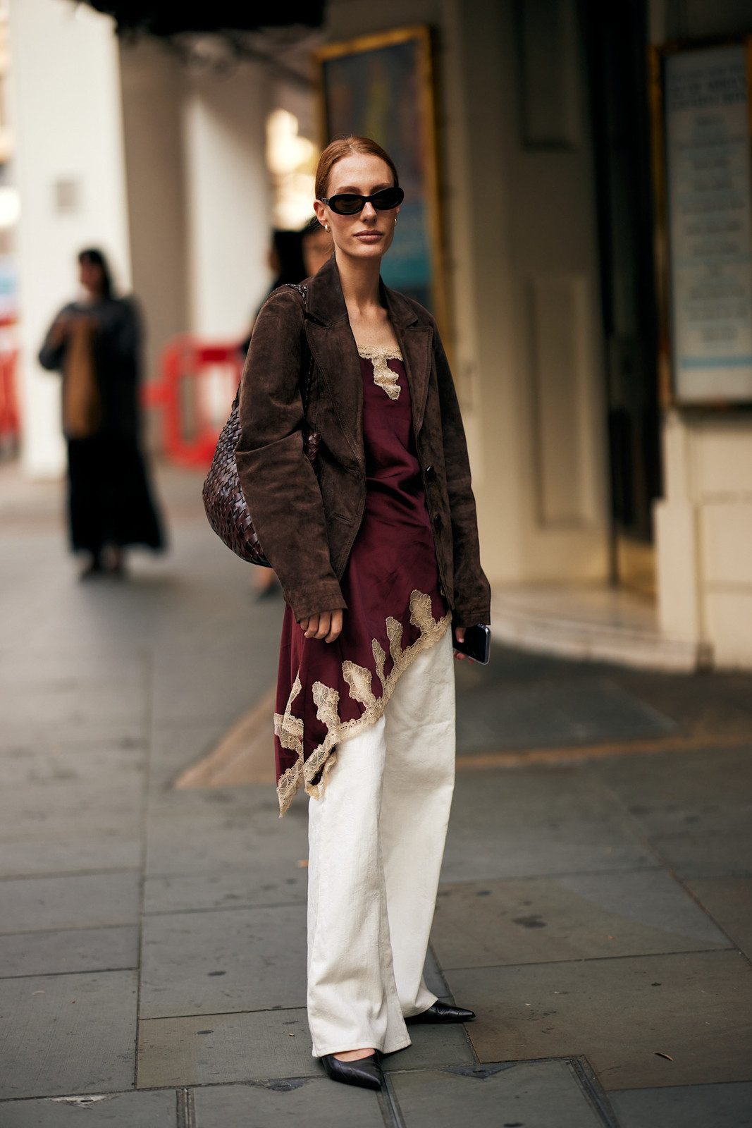 Black Longline Coat with White Sneakers Black Longline Coat with White Sneakers — London Outfits 2027