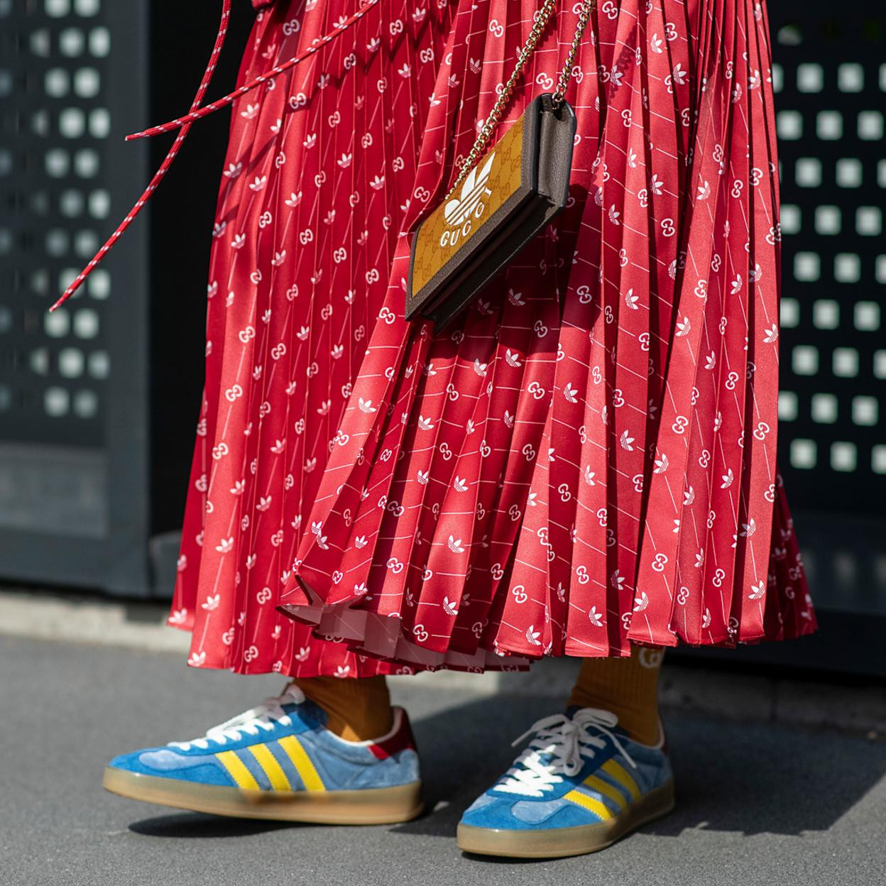 Pleated Skirt with Logo Sneakers for a Playful Look Pleated Skirt with Logo Sneakers for a Playful Look — Spring Outfits 2027 with Sneakers