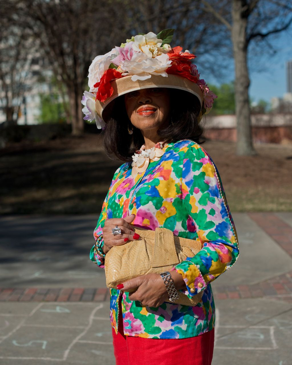 Multicolor Floral Blouse with Red Trousers and Floral Hat Multicolor Floral Blouse with Red Trousers and Floral Hat — Easter Church Outfits 2027
