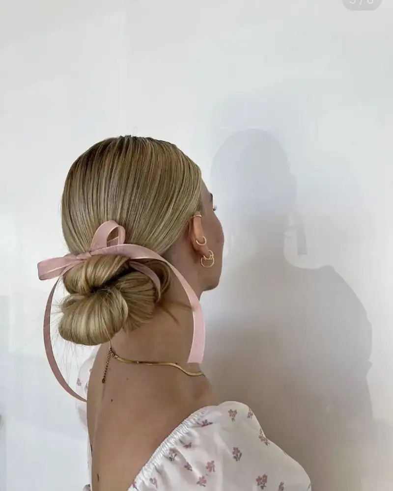 Ash Blonde Low Bun With Pink Ribbon Ash Blonde Low Bun With Pink Ribbon — Messy Bun 2027