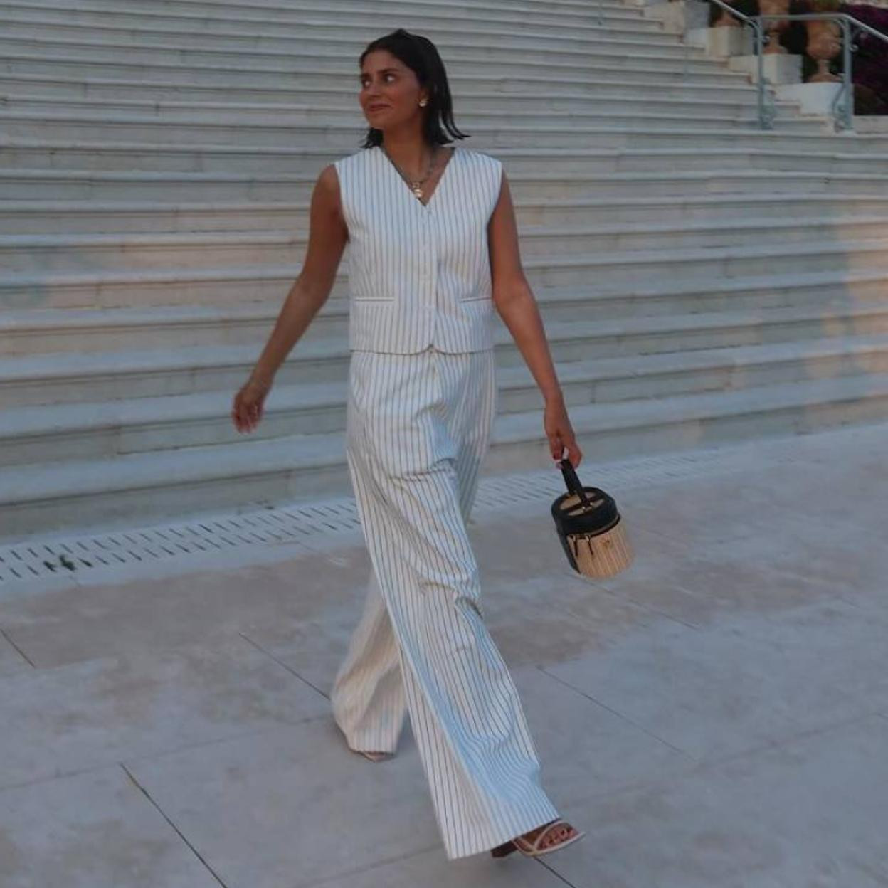 Pinstripe Vest Jumpsuit for Daytime Occasions — Summer Jumpsuit Outfits 2027