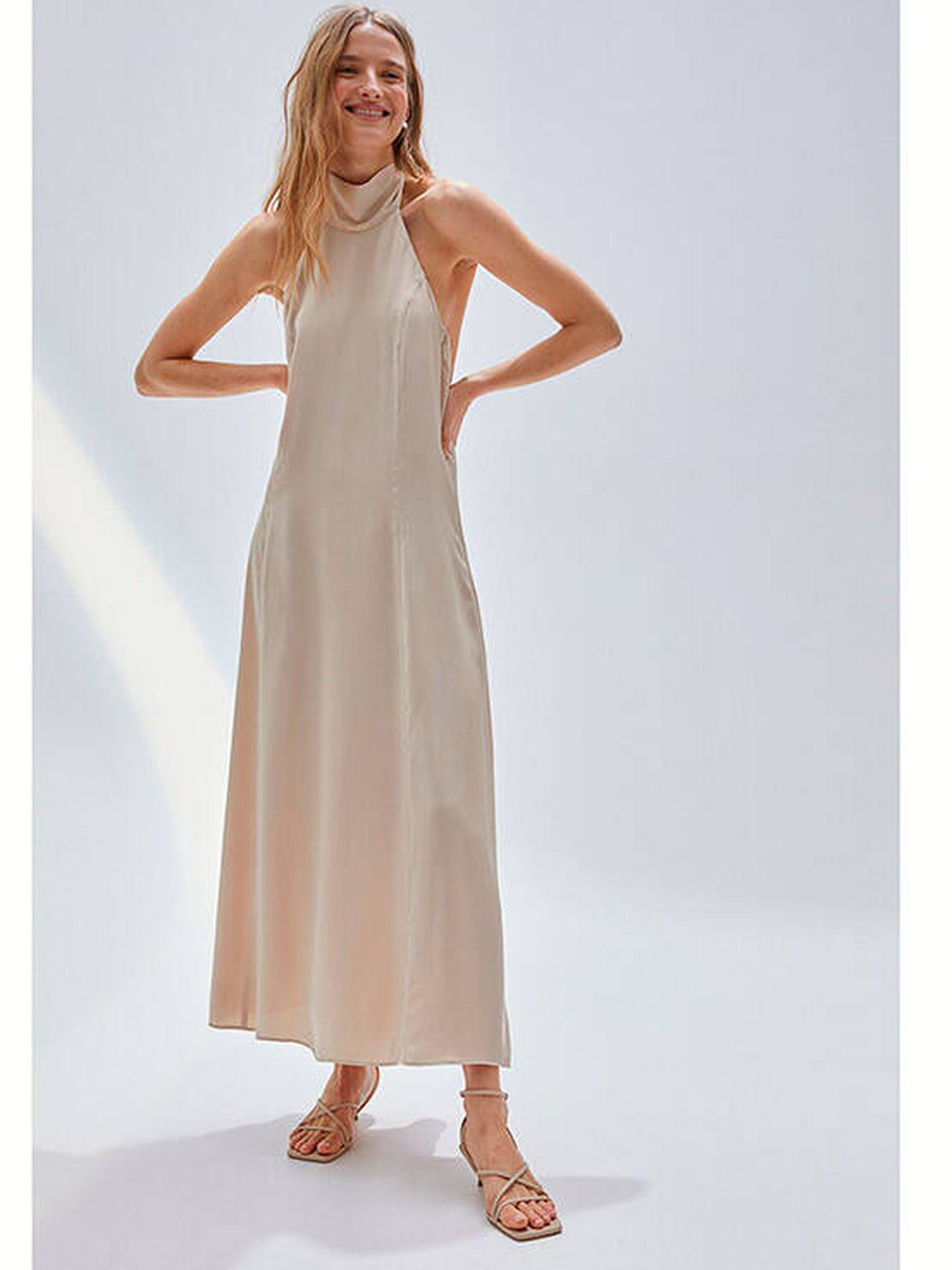 Flowing Beige Halterneck Satin Maxi Dress for Chic Bachelorette Flowing Beige Halterneck Satin Maxi Dress for Chic Bachelorette — Summer Bachelorette Outfits 2027