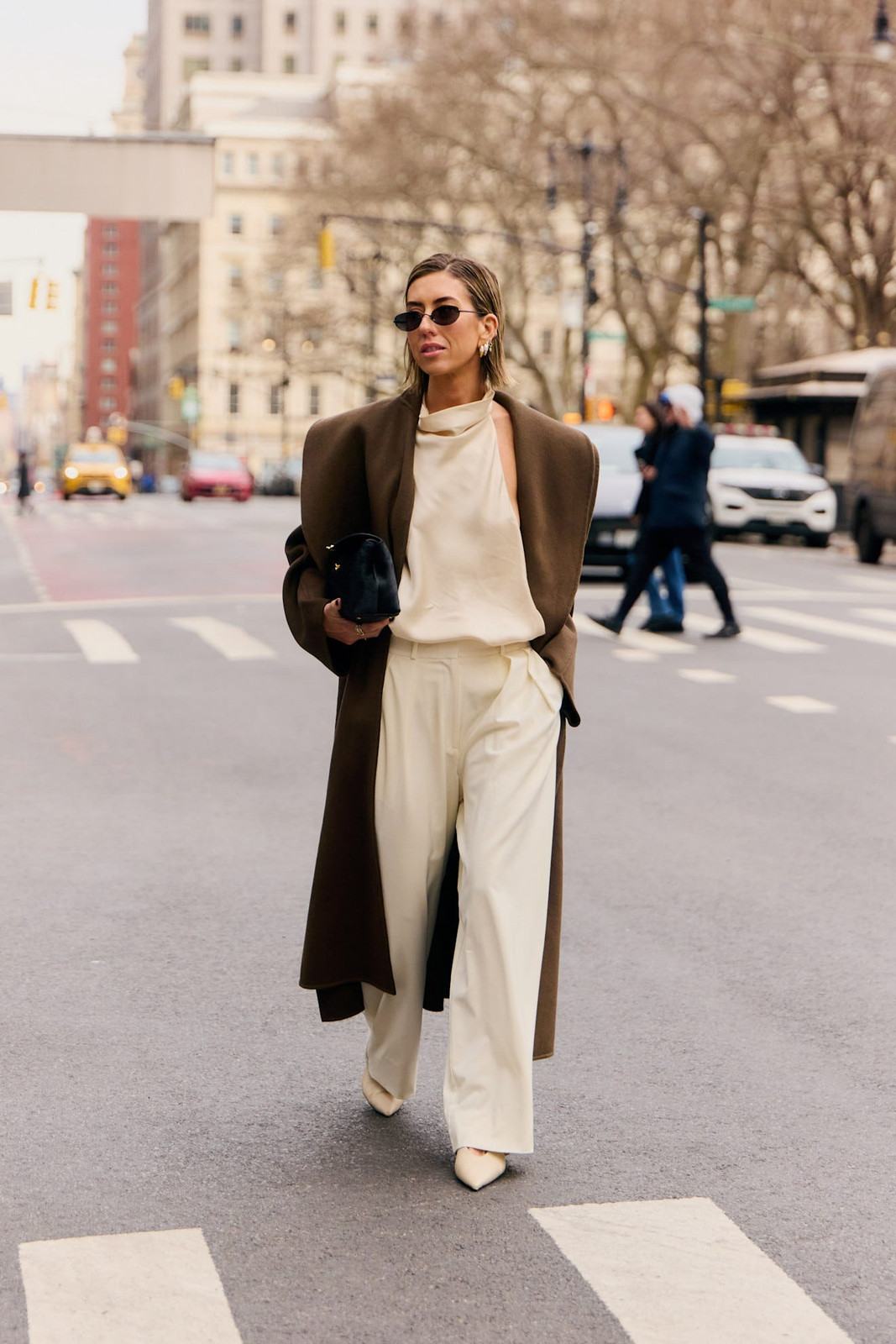 Oversized Brown Coat Over Cream Cowl Neck Top and Wide-Leg Trousers Oversized Brown Coat Over Cream Cowl Neck Top and Wide-Leg Trousers — Winter Neutral Outfits 2027