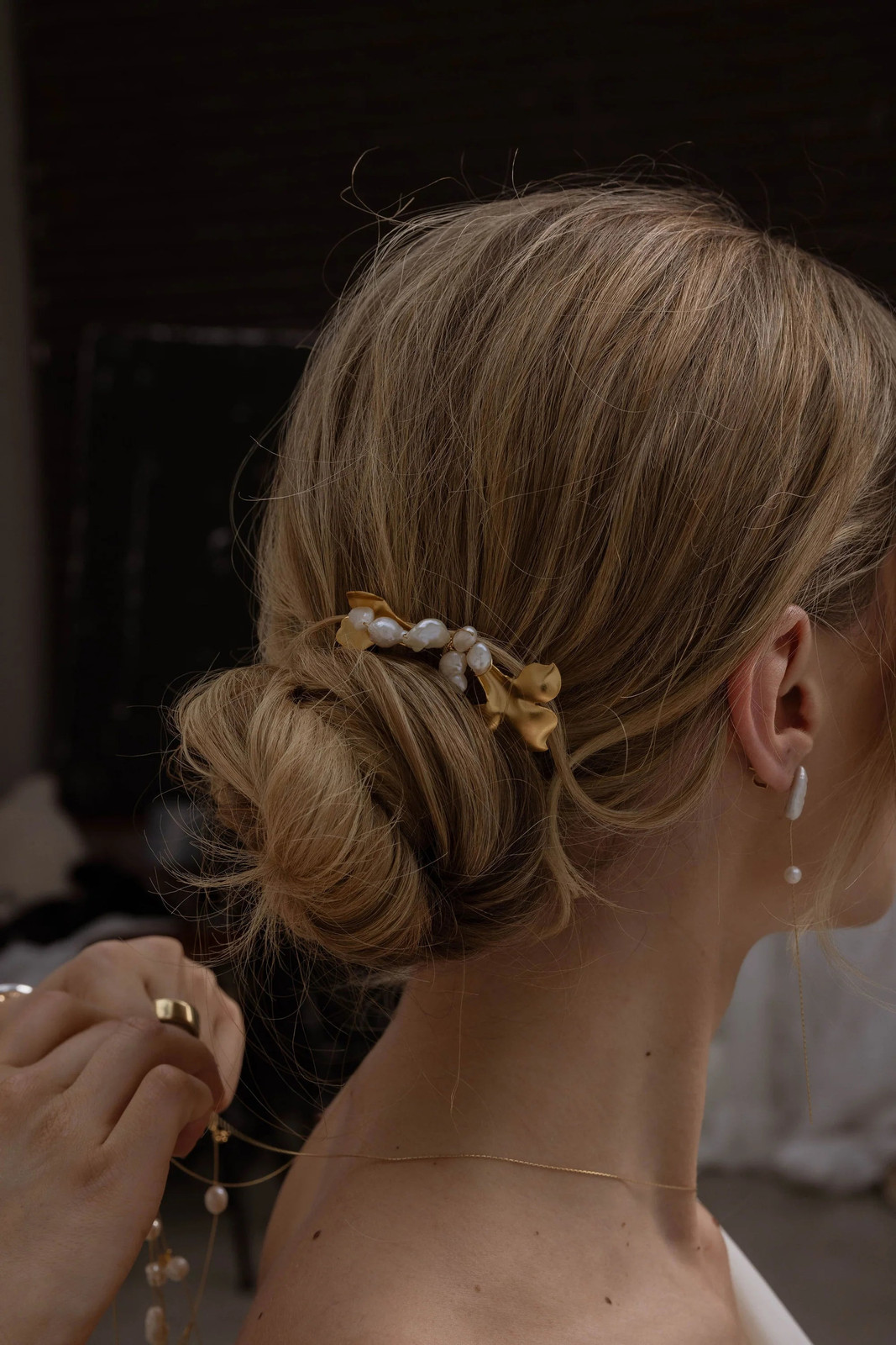 Blonde Side Low Bun — Bridesmaid Hairstyles 2027