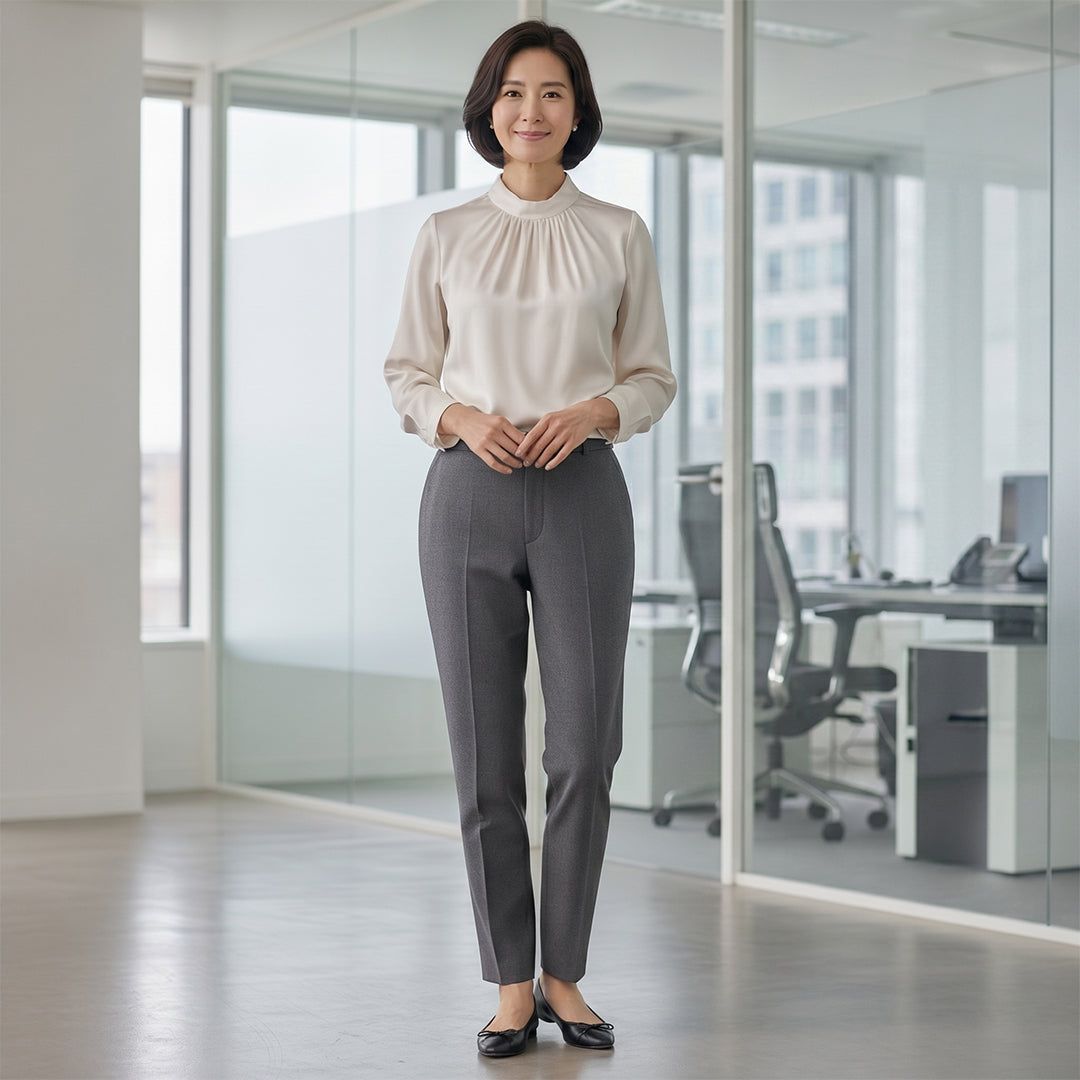 Polished Professionalism: Ivory Satin Blouse and Grey Trousers Polished Professionalism: Ivory Satin Blouse and Grey Trousers — Interview Outfits 2027
