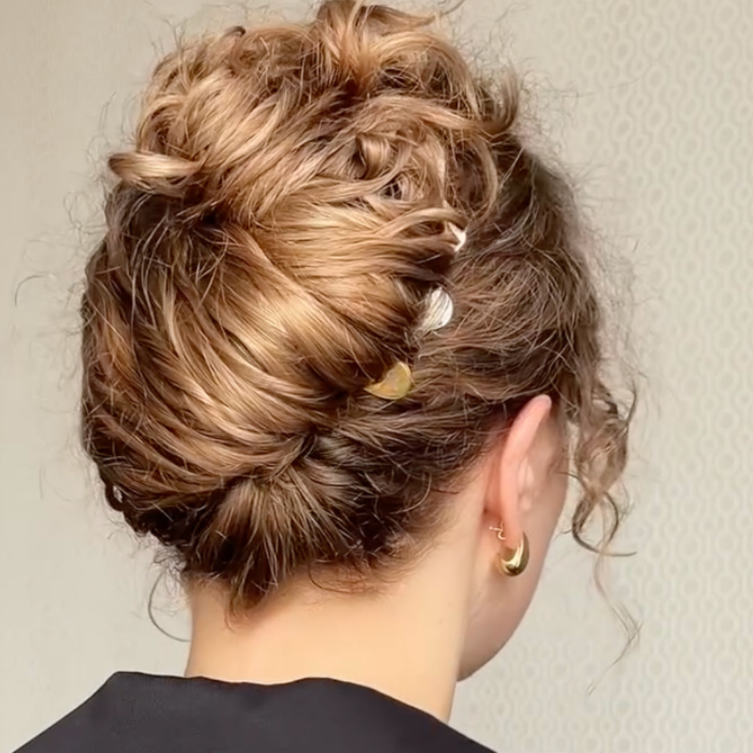 Visual Idea — A High Messy Bun 2027