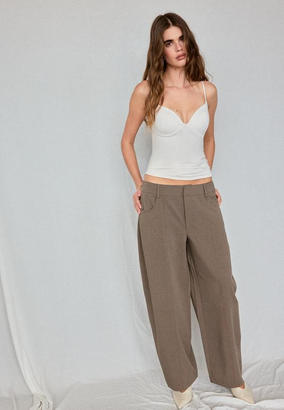 Off-White Corset Tank Top with Wide-Leg Brown Trousers Off-White Corset Tank Top with Wide-Leg Brown Trousers — Spring Corset Top Outfits 2027