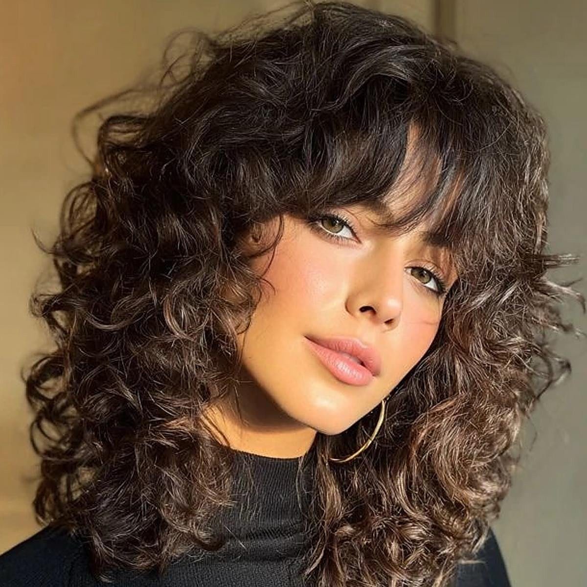 Thick Wavy Shag With Full Bangs Thick Wavy Shag With Full Bangs — Haircuts 2027 for Wavy Hair