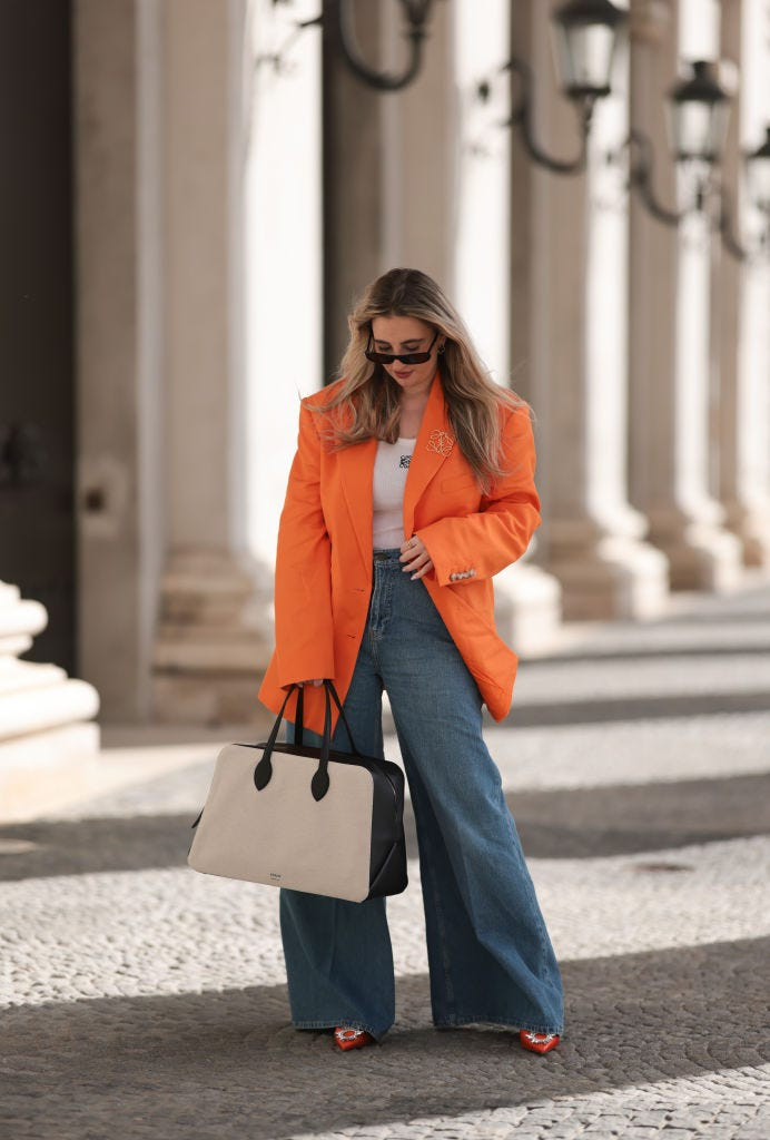 Blue Denim Flare Pants with White Tank and Orange Blazer Blue Denim Flare Pants with White Tank and Orange Blazer — Skinny Flare Pants Outfits 2027
