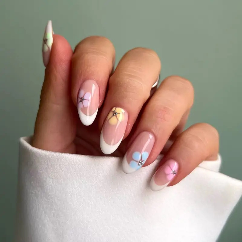 Pastel Floral Accents On French Tips Visual Idea Pastel Floral Accents On French Tips Visual Idea — Floral Acrylic Nails 2027