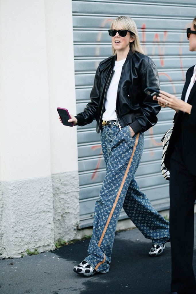 Leather Bomber Jacket with Monogram Trousers and Silver Sneakers Leather Bomber Jacket with Monogram Trousers and Silver Sneakers — Spring Outfits 2027 with Sneakers