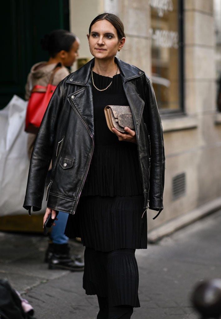 Classic Biker: Leather Jacket Over Pleated Midi Classic Biker: Leather Jacket Over Pleated Midi — Rockstar Girlfriend Outfits 2027