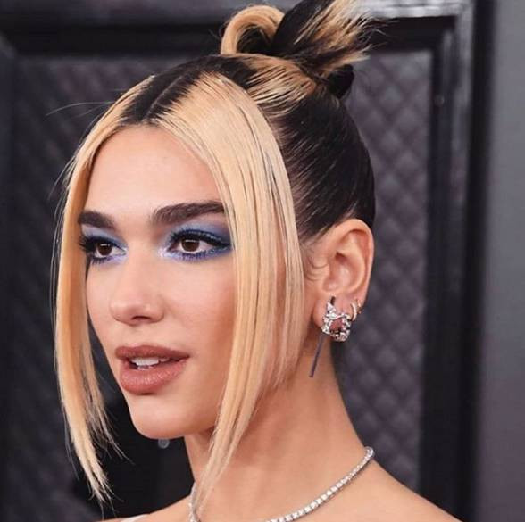 High Bun With Front Tendrils High Bun With Front Tendrils — 90s Hairstyles 2027