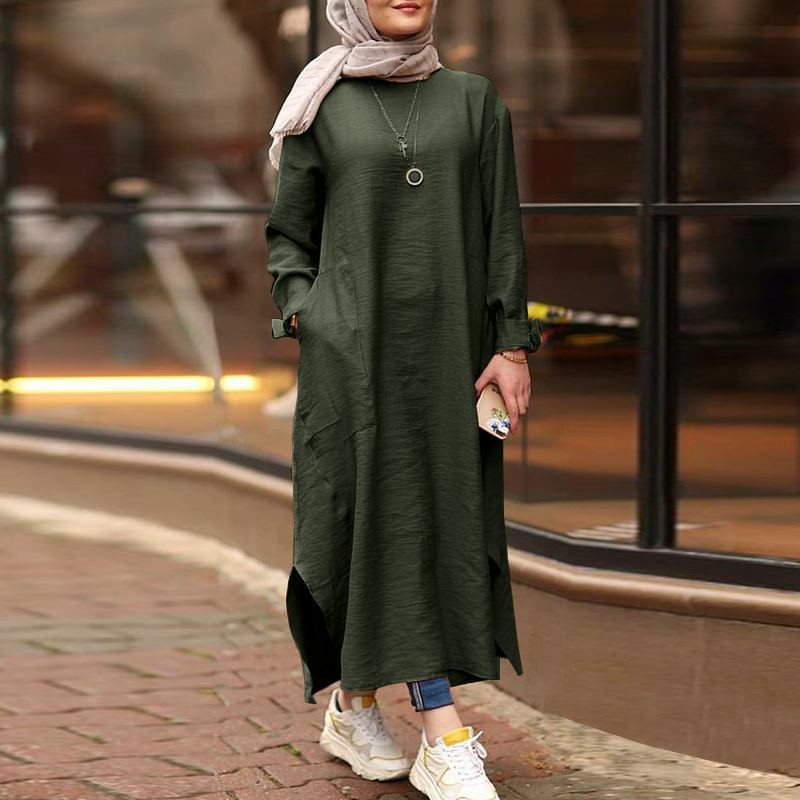 Olive Green Tunic with Side Slits Over Blue Jeans Olive Green Tunic with Side Slits Over Blue Jeans — Hijab Outfits 2027