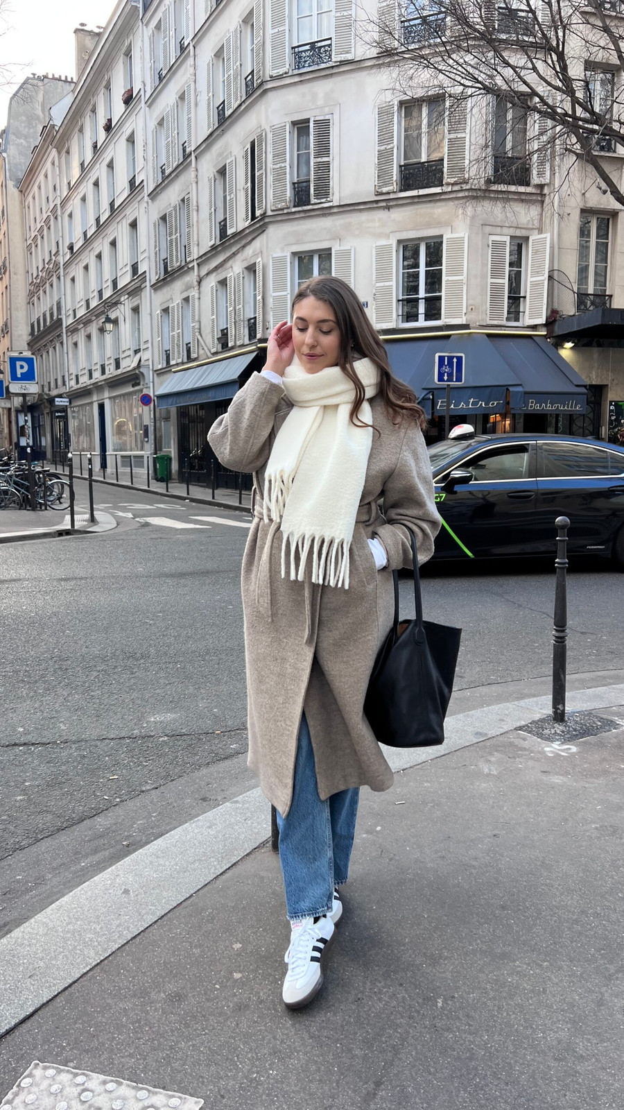 Belted Trench Coat with Blue Jeans and Sneakers Belted Trench Coat with Blue Jeans and Sneakers — Paris Outfits 2027
