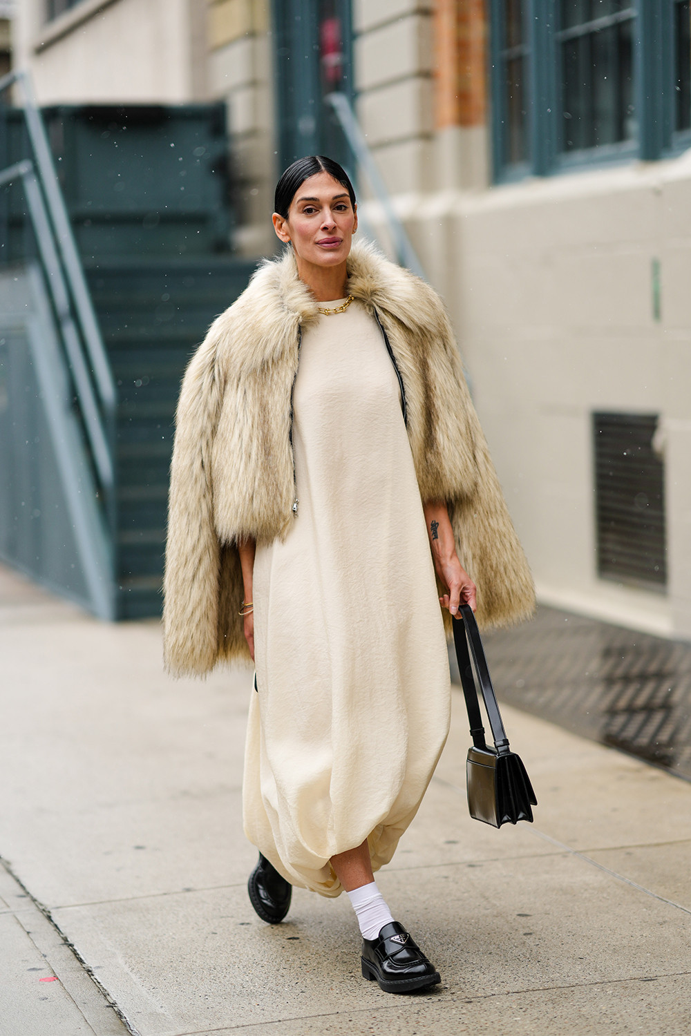 Beige Faux Fur Coat Draped Over Cream Dress Beige Faux Fur Coat Draped Over Cream Dress — Faux Fur Outfits 2027