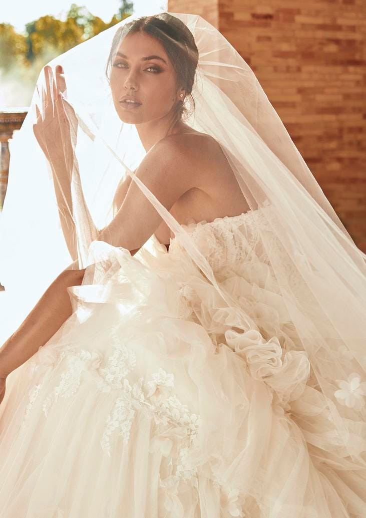 Medium Elegant Dark Brown Updo — Bridesmaid Hairstyles 2027