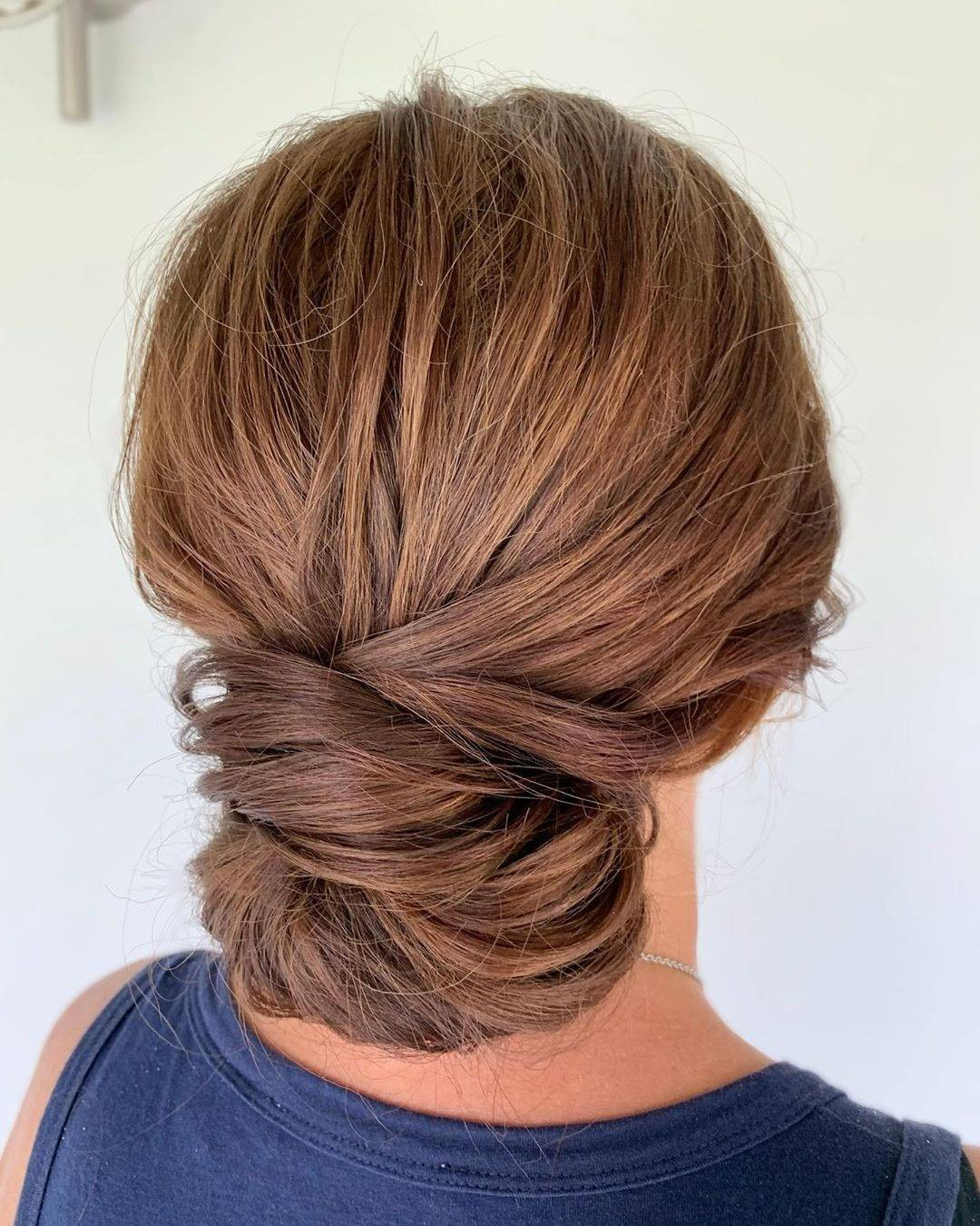 Medium Brown Textured Low Bun — Wedding Guest Updos 2027