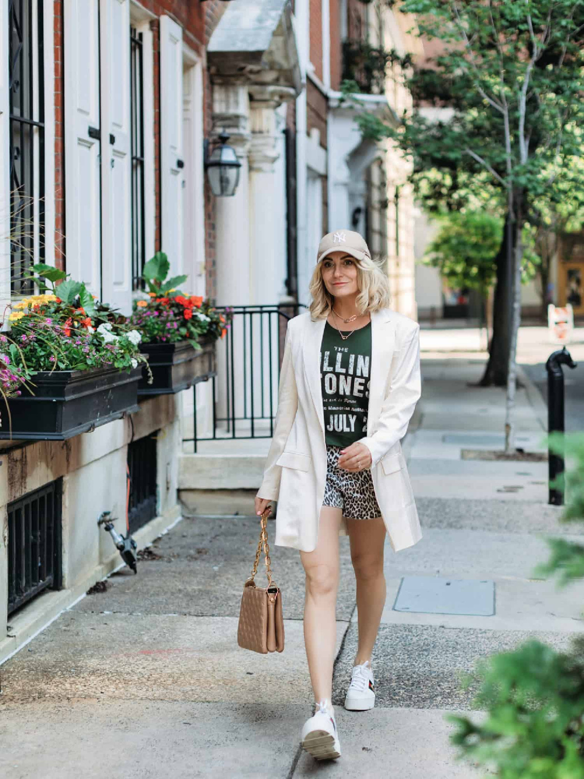 Graphic Tee and Leopard Shorts: Urban Casual with a Playful Twist Graphic Tee and Leopard Shorts: Urban Casual with a Playful Twist — Urban Outfitters Outfits 2027