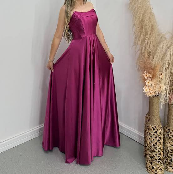 Deep Fuchsia Satin Corset Dress with Flowing Skirt and Tie-Back Detail Deep Fuchsia Satin Corset Dress with Flowing Skirt and Tie-Back Detail — Corset Prom Dresses 2027