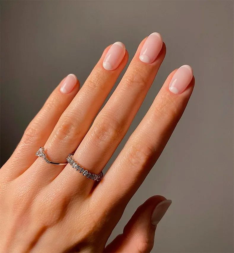 Modern French Tip with White Swirl — Short Wedding Nails 2027