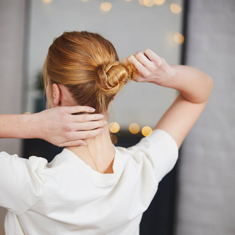 Neatly Twisted Honey Blonde Low Bun Neatly Twisted Honey Blonde Low Bun — Hairstyles 2027 for Hot Weather